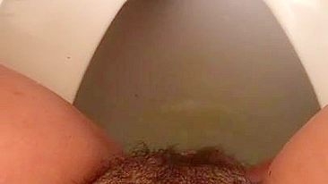 Lebanese mom loves hairy pussy and captures it during XXX pissing