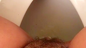 Lebanese mom loves hairy pussy and captures it during XXX pissing