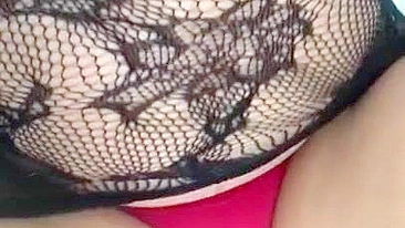 Pervert Arab mom in fishnet nightgown touches her XXX sized boobies