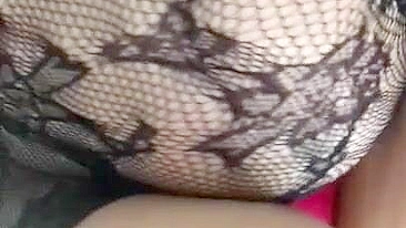 Pervert Arab mom in fishnet nightgown touches her XXX sized boobies