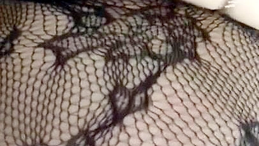 Pervert Arab mom in fishnet nightgown touches her XXX sized boobies