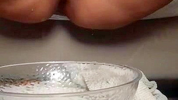 Lovely Arab mom masturbates snatch to XXX squirt in a glass bowl