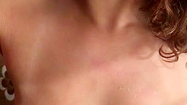 Egyptian mom with dark hair enjoys XXX toy in her mouth in the close-up video