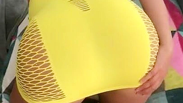 Algerian mom pulls tight yellow dress up a bit to expose XXX shaped ass