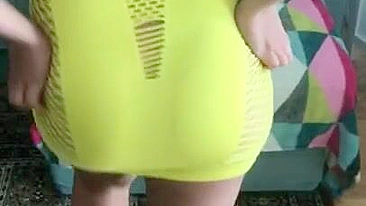 Algerian mom pulls tight yellow dress up a bit to expose XXX shaped ass