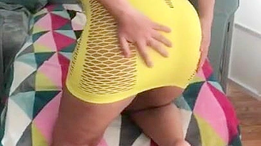 Algerian mom pulls tight yellow dress up a bit to expose XXX shaped ass
