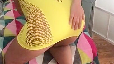 Algerian mom pulls tight yellow dress up a bit to expose XXX shaped ass