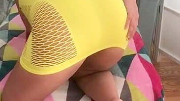 Algerian mom pulls tight yellow dress up a bit to expose XXX shaped ass