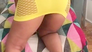 Algerian mom pulls tight yellow dress up a bit to expose XXX shaped ass