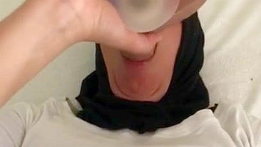 Arab mom in hijab drills her throat with sex toy in the solo XXX video