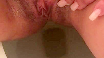 Naked Arab mom in hijab pisses missing toilet in fetish XXX porn close-up