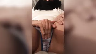 Pretty mom in hijab seductively rubs XXX vagina sitting on the sofa