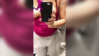 Shameless Arab mom shows and records her tits in the changing booth