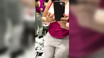 Shameless Arab mom shows and records her tits in the changing booth