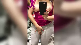 Shameless Arab mom shows and records her tits in the changing booth