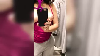 Shameless Arab mom shows and records her tits in the changing booth