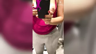 Shameless Arab mom shows and records her tits in the changing booth