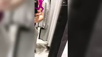 Shameless Arab mom shows and records her tits in the changing booth