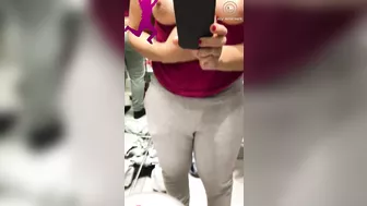 Shameless Arab mom shows and records her tits in the changing booth