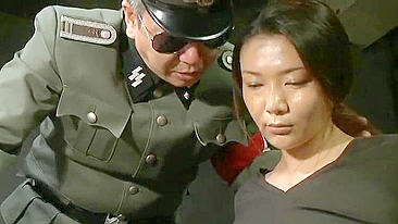 Cruel Japanese soldiers brutally abuse female prisoner during interrogation