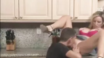 Negligent mom is interested in oral sex with handsome son in kitchen