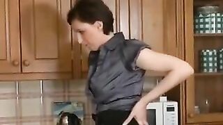 Long-legged mom and son's friend have quickie right in the kitchen