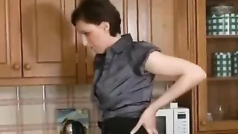 Long-legged mom and son's friend have quickie right in the kitchen