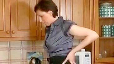 Long-legged mom and son's friend have quickie right in the kitchen