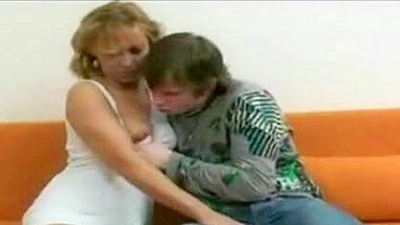 Excited boy enjoys hard quickie with friend's mom in living room