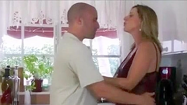Bald stud sneakily and passionately fucks classy mom in kitchen