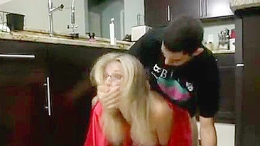 Blonde mom with glasses sneakily banged by stepson in the kitchen