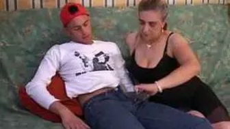 Mature mom permits horny stepson to impale both her holes on sofa