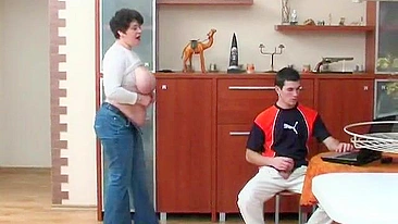 Attractive BBW mom catches stepson jerking off to porn and helps him