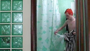 Bespectacled mom has XXX fun with guy with red hair after shower