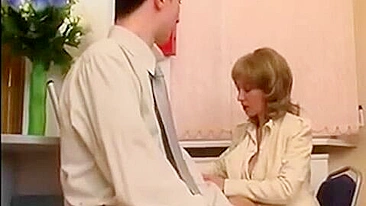 XXX porn of young man who fucks Russian mom with saggy boobs in office