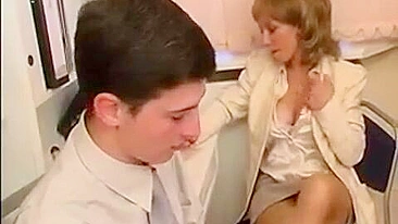 XXX porn of young man who fucks Russian mom with saggy boobs in office