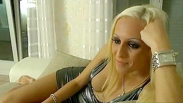 Blonde XXX slut takes part in a porn movie next to her sleeping bestie