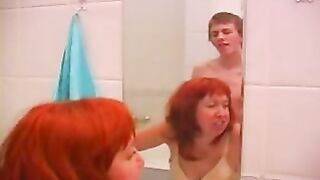 Red-haired mom rewarded with XXX facial after sex with boy in bath