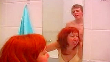 Red-haired mom rewarded with XXX facial after sex with boy in bath