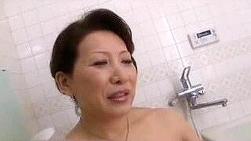 Curvy Japanese mom relaxes in XXX bath together with her stepson