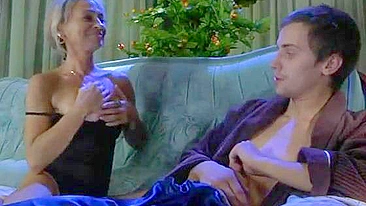 Surprised guy seduced by girlfriend's horny blond mom with big XXX tits