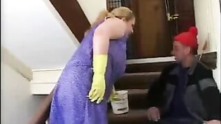 Chubby mom interrupts cleaning to have XXX fun with errand boy on stairs