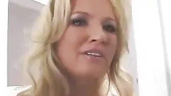 Hot blond mom with XXX jugs uses stepson's bulge for own pleasure