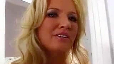 Hot blond mom with XXX jugs uses stepson's bulge for own pleasure