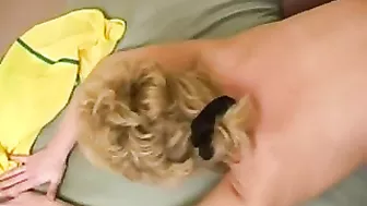 Football player relaxes on bed together with mom in XXX stockings