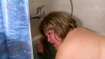 Russian boy fucks wet slit of his chubby XXX stepmom in the bathtub