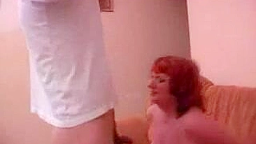 Mature red-haired mom seduces young lover on XXX session at home