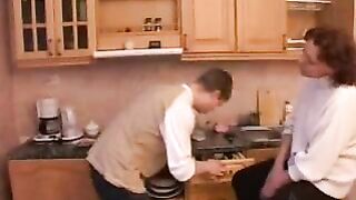 Russian XXX mom catches teen stepson in the kitchen and fucks him