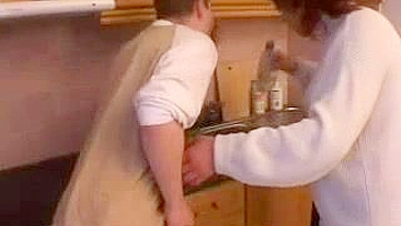 Russian XXX mom catches teen stepson in the kitchen and fucks him