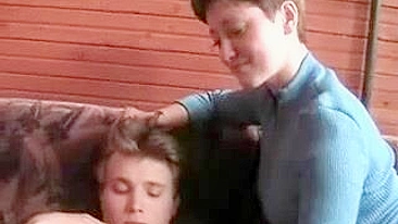 Caring mom relaxes her beloved stepson with XXX copulation at home